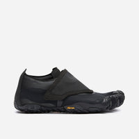 Pair of Trailope Women's Black for trail running in a minimalist shoe